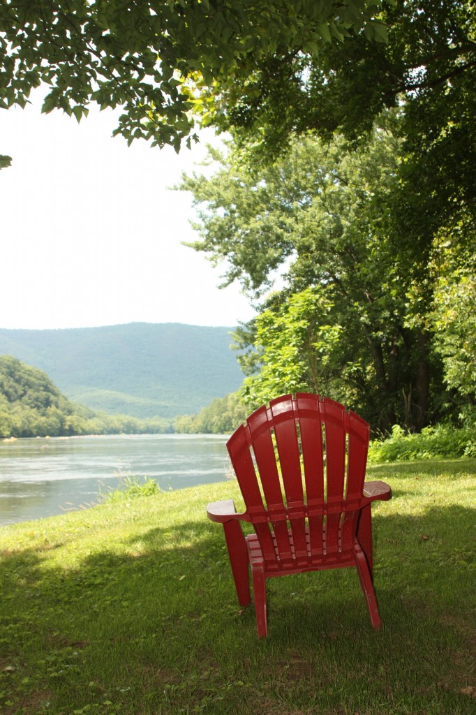Red chair by water